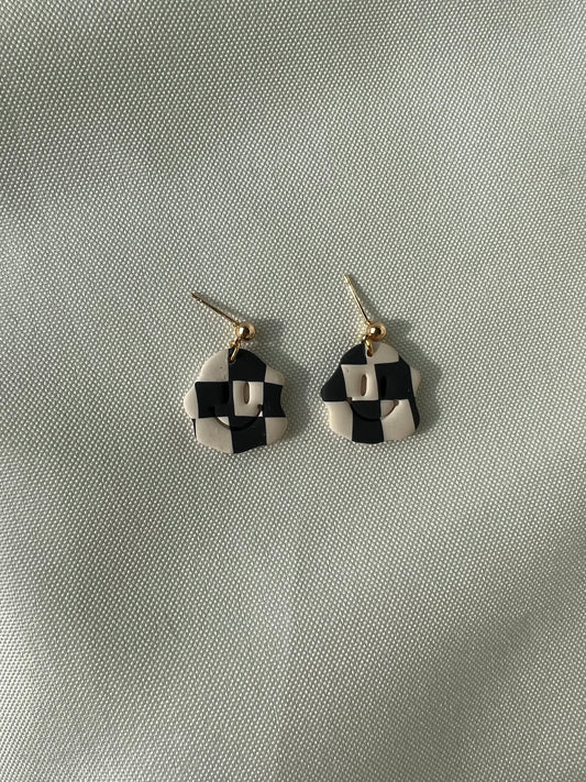 black and cream checkered smiley face