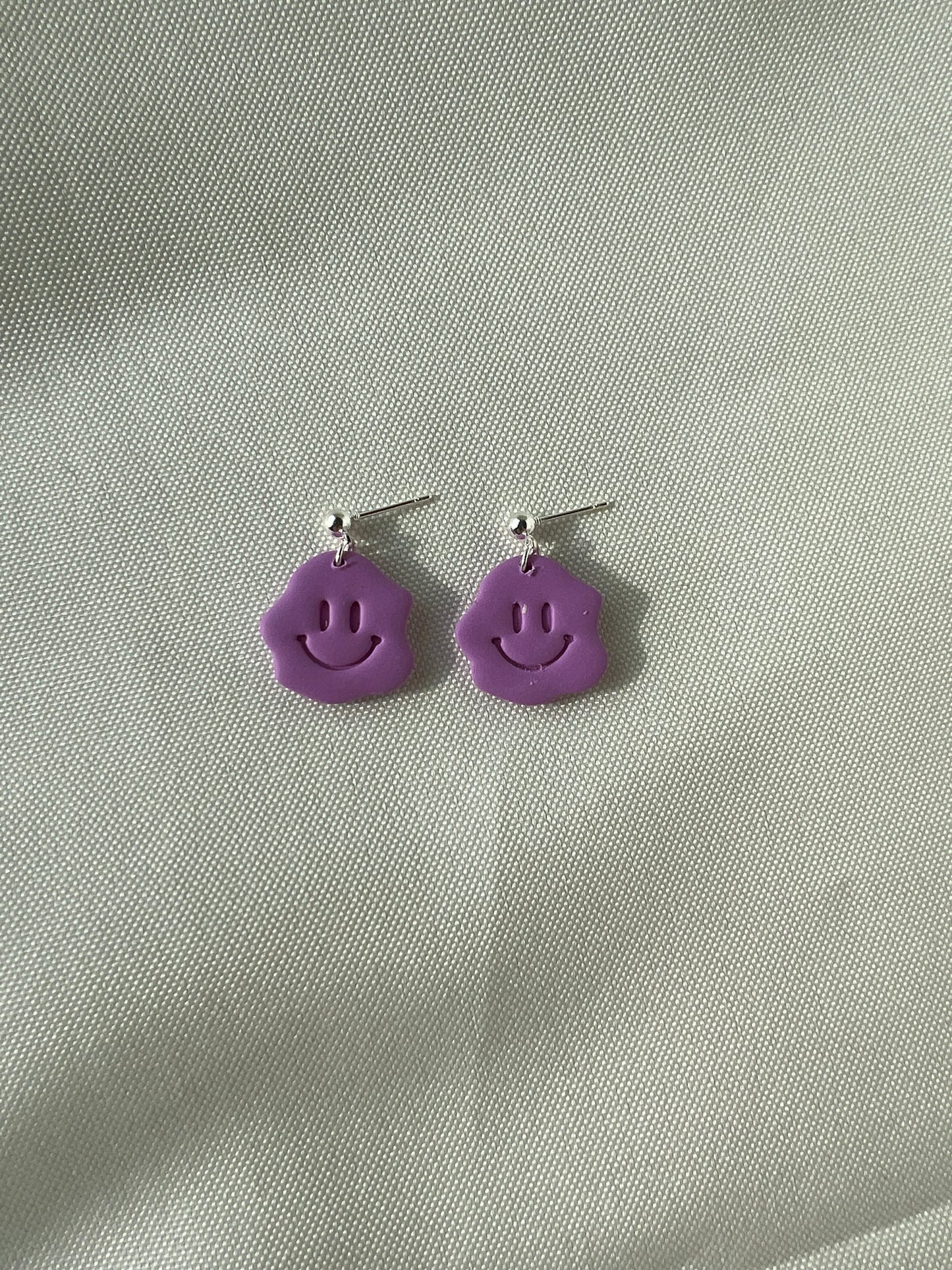 purple smiley face